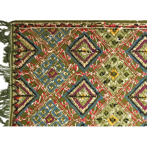 1107 - Rectangular Turkish Kilim green ground rug, 250cm x 155cm