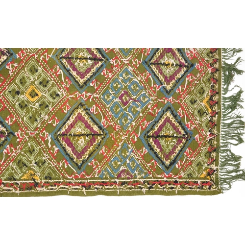 1107 - Rectangular Turkish Kilim green ground rug, 250cm x 155cm