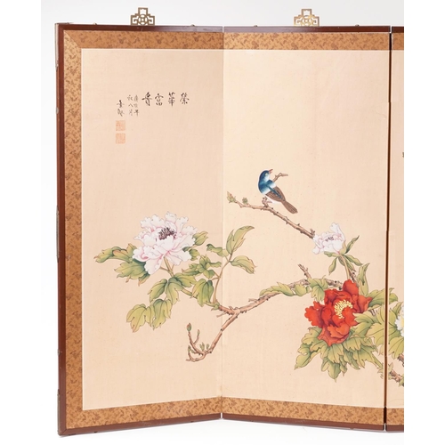 425 - Chinese four fold silk screen hand painted with birds amongst flowers, signed with calligraphy and r... 