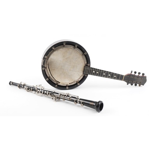 1204 - Reliance eight string banjolele and a Boosey & Hawkes three piece oboe, both with cases, the largest... 