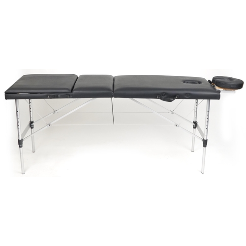 1047 - Folding aluminium and black leatherette massage table with protective bag, 83cm H x 184cm W x 59cm D... 