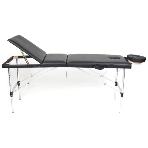 1047 - Folding aluminium and black leatherette massage table with protective bag, 83cm H x 184cm W x 59cm D... 