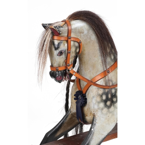 1002 - Stevenson Brothers gesso dapple grey rocking horse on stand, 96cm high x 104cm in length