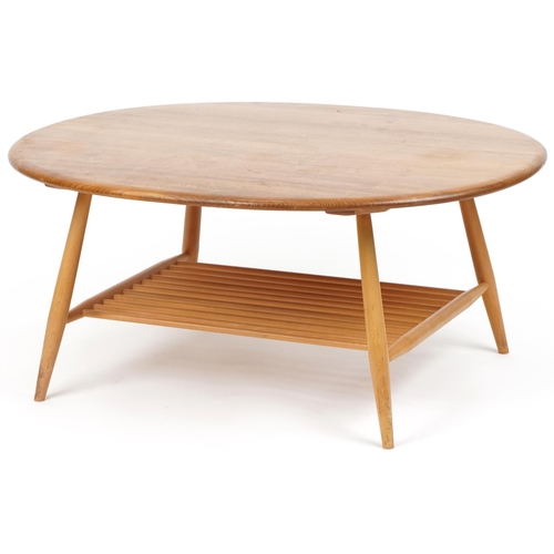 Ercol light elm coffee table with oval top, 44cm H x 99cm W x 82cm D
