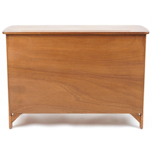 1009 - Ercol elm sideboard fitted with two drawers above a pair of cupboard doors, 85cm H x 122cm W x 48cm ... 