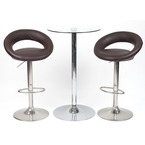 1007 - Contemporary chrome breakfast table with circular glass top and pair of adjustable stools with brown... 