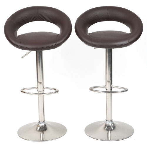 1007 - Contemporary chrome breakfast table with circular glass top and pair of adjustable stools with brown... 