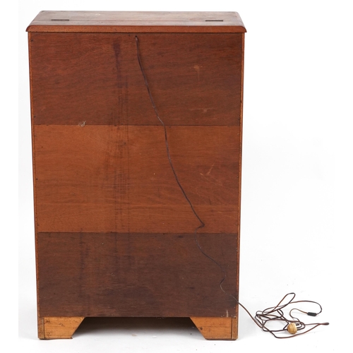 1069 - Art Deco walnut cocktail cabinet fitted with a fall enclosing a mirrored interior above a cupboard b... 