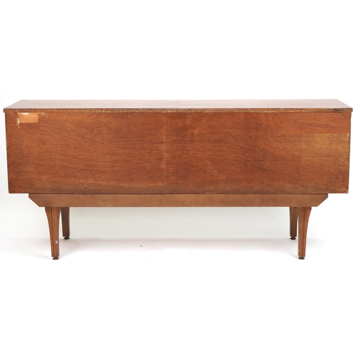 1050 - Mid century teak sideboard fitted with an arrangement of two drawers and four cupboard doors, 76cm H... 