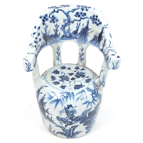 1076 - Chinese blue and white porcelain garden seat hand painted with flowers, 65cm high