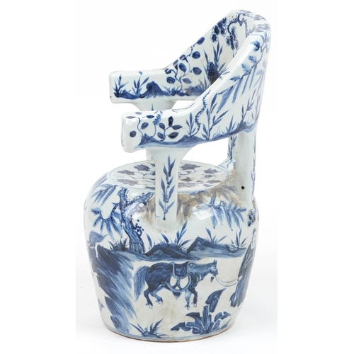 1076 - Chinese blue and white porcelain garden seat hand painted with flowers, 65cm high