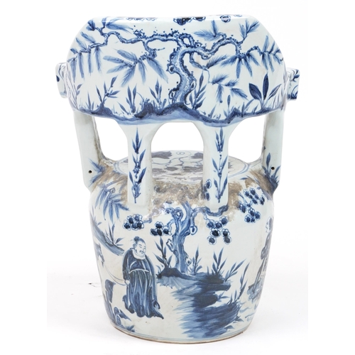 1076 - Chinese blue and white porcelain garden seat hand painted with flowers, 65cm high