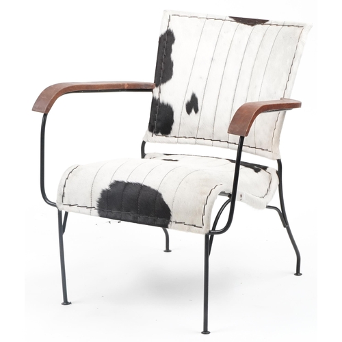 1078 - Brutalist style wrought iron and cow hide armchair, 75cm high