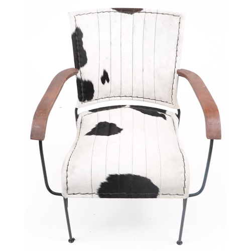 1078 - Brutalist style wrought iron and cow hide armchair, 75cm high