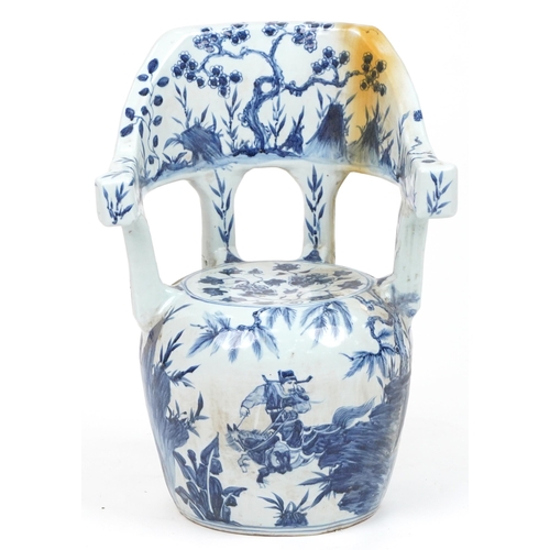 1077 - Chinese blue and white porcelain garden seat hand painted with flowers, 65cm high