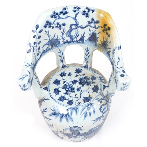 1077 - Chinese blue and white porcelain garden seat hand painted with flowers, 65cm high