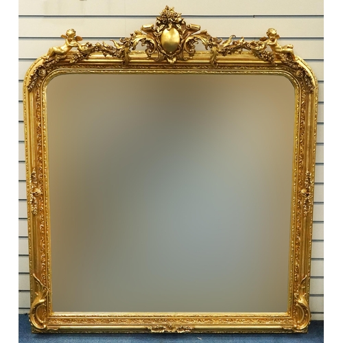 1114 - Large ornate gilt framed wall mirror having bevelled glass and mounted with Putti and swags, 160cm x... 