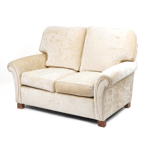 1034 - Contemporary beige upholstered two seater settee, 100cm H x 145cm W x 100cm D