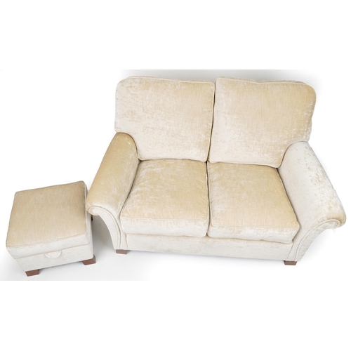 1033 - Contemporary beige upholstered two seater settee with matching footstool, 100cm H x 145cm W x 100cm ... 