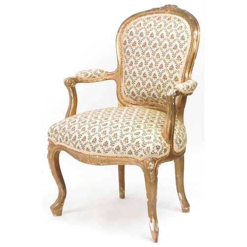 1080 - French gilt framed elbow chair with floral upholstery, 99cm high