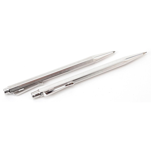 202 - Carin D'Ache, Swiss engine turned propelling pencil and ballpoint pen with fitted case