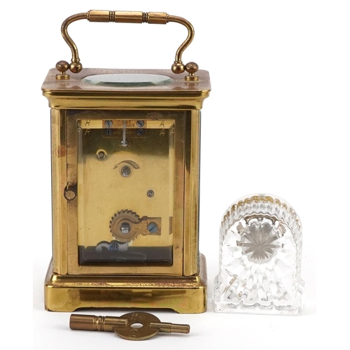 1373 - French brass cased carriage clock with enamelled dial having Roman numerals and an Edinburgh Crystal... 