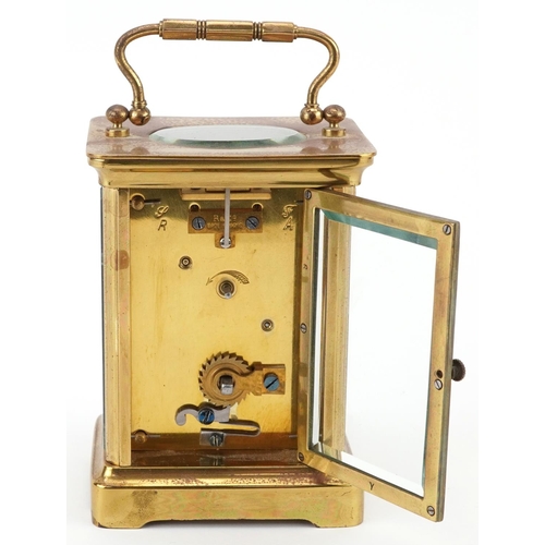 1373 - French brass cased carriage clock with enamelled dial having Roman numerals and an Edinburgh Crystal... 