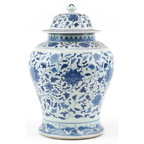 507 - Large Chinese blue and white porcelain baluster jar and cover hand painted with flower heads amongst... 