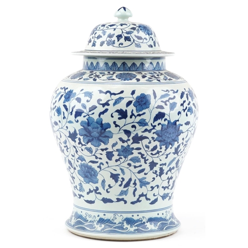 507 - Large Chinese blue and white porcelain baluster jar and cover hand painted with flower heads amongst... 