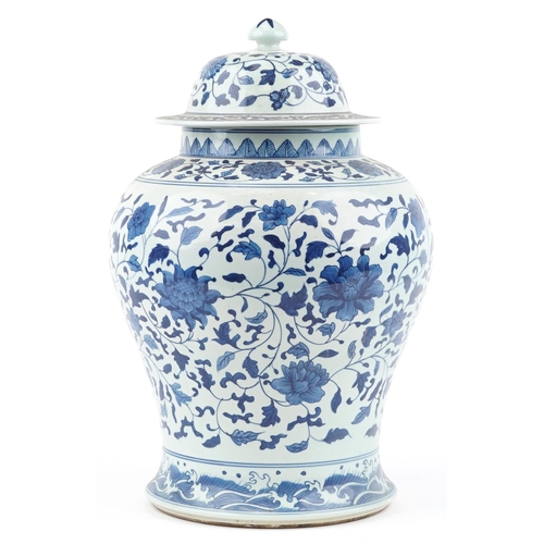 507 - Large Chinese blue and white porcelain baluster jar and cover hand painted with flower heads amongst... 