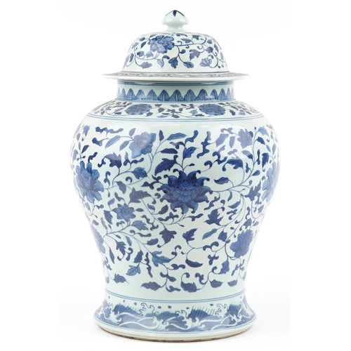 507 - Large Chinese blue and white porcelain baluster jar and cover hand painted with flower heads amongst... 