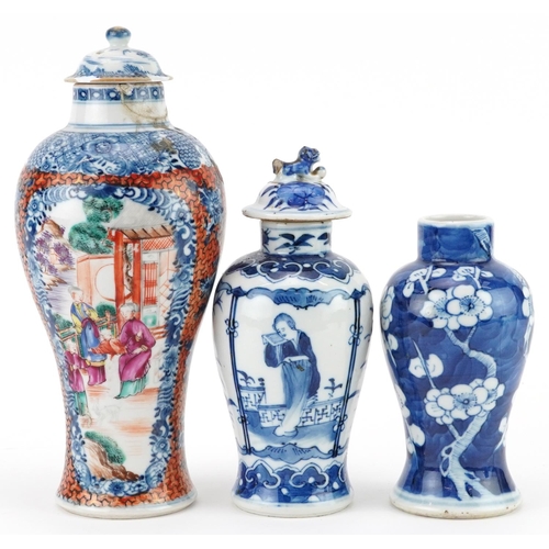 214 - Three Chinese porcelain baluster vases with two covers including a Mandarin example hand painted wit... 