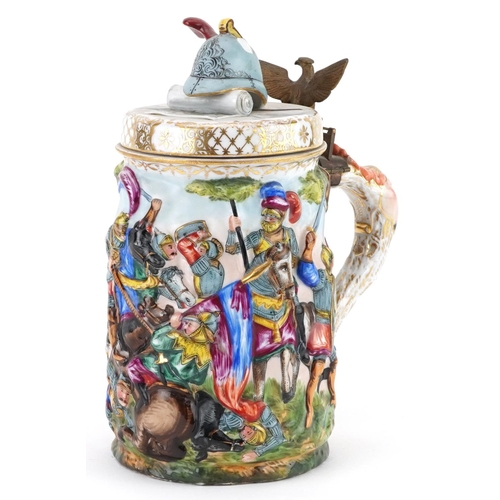 314 - Capodimonte, 19th century Italian porcelain stein and cover decorated in relief with a continuous ba... 