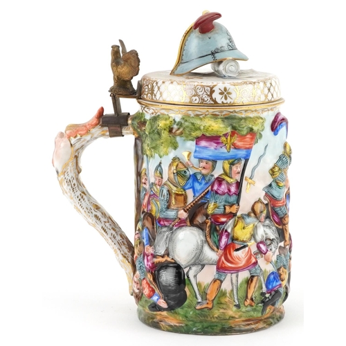 314 - Capodimonte, 19th century Italian porcelain stein and cover decorated in relief with a continuous ba... 