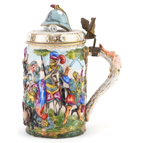 314 - Capodimonte, 19th century Italian porcelain stein and cover decorated in relief with a continuous ba... 