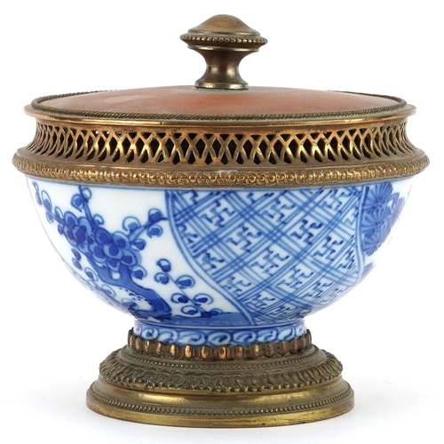 219 - Japanese Nabeshima blue and white porcelain bowl with gilt brass mounts, 11.5cm high