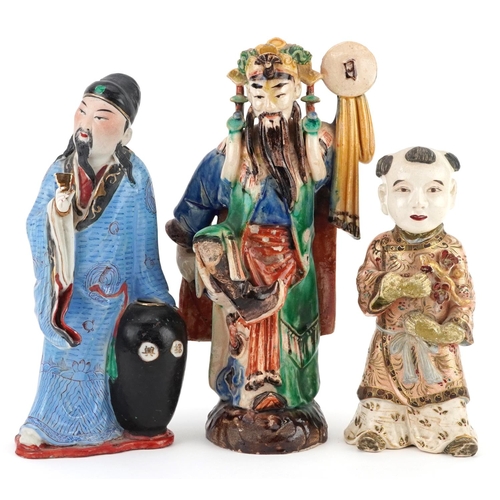 1382 - Three Chinese and Japanese figures including a Satsuma example of a young boy, the largest 23.5cm hi... 