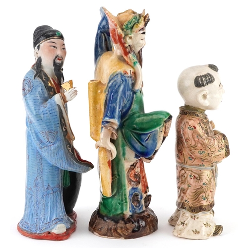 1382 - Three Chinese and Japanese figures including a Satsuma example of a young boy, the largest 23.5cm hi... 