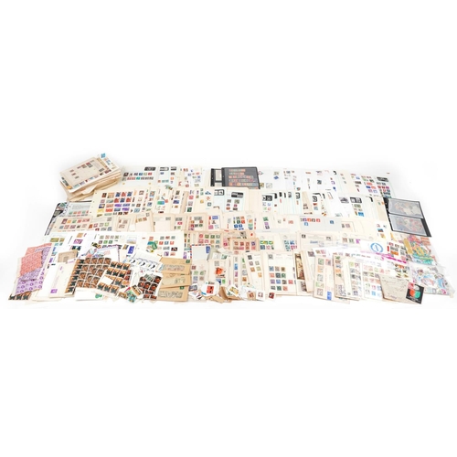 1808 - Extensive collection of world stamps arranged on sheets