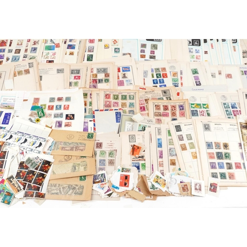 1808 - Extensive collection of world stamps arranged on sheets