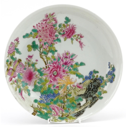 374 - Chinese porcelain shallow dish hand painted in the famille rose palette with flowers, four figure ch... 