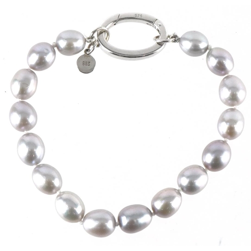 2232 - Clogau, Welsh silver clear stone love heart bracelet and a freshwater pearl bracelet with silver cla... 