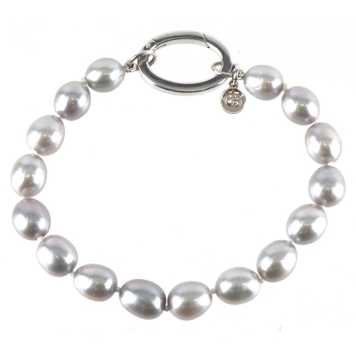 2232 - Clogau, Welsh silver clear stone love heart bracelet and a freshwater pearl bracelet with silver cla... 