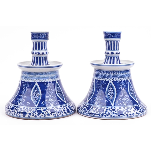 416 - Pair of Chinese Islamic blue and white porcelain hookah bases hand painted with flowers, each 24cm h... 