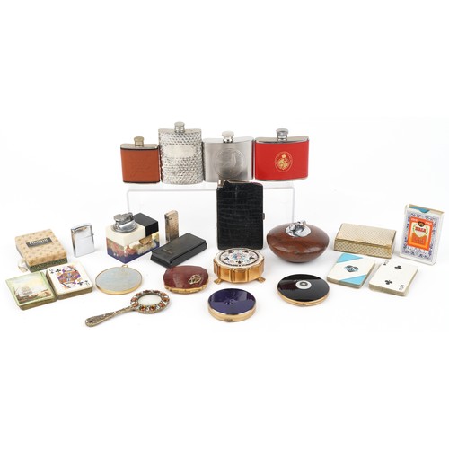 1457 - Sundry items including a marine table lighter, hip flasks, compact and vintage playing cards, the la... 