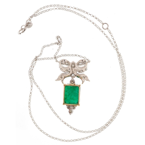 2050 - 18ct white and yellow gold diamond and emerald pendant in the form of a bow on an 18ct white gold ne... 