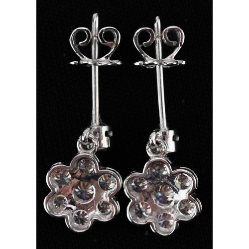 2031 - Pair of 18ct white gold round brilliant cut diamond flower head drop earrings, total diamond weight ... 