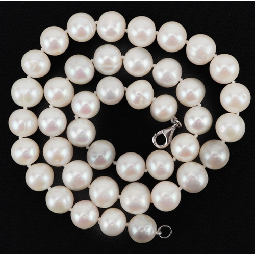 2113 - Single row cultured pearl necklace with silver clasp, each pearl approximately 9.5mm in diameter, ov... 