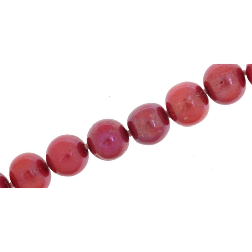 2158 - Cultured pink pearl bracelet with silver gilt clasp, each pearl approximately 7.0mm in diameter, ove... 