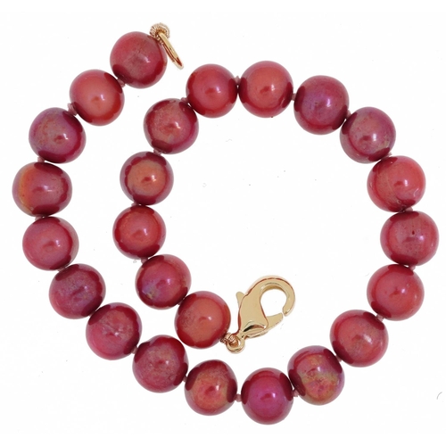 2158 - Cultured pink pearl bracelet with silver gilt clasp, each pearl approximately 7.0mm in diameter, ove... 